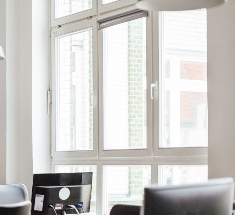 Office window with monitors - Commercial Glass Repair, Replacement & Tint Services Office window with monitors - Commercial Glass Repair, Replacement & Tint Services